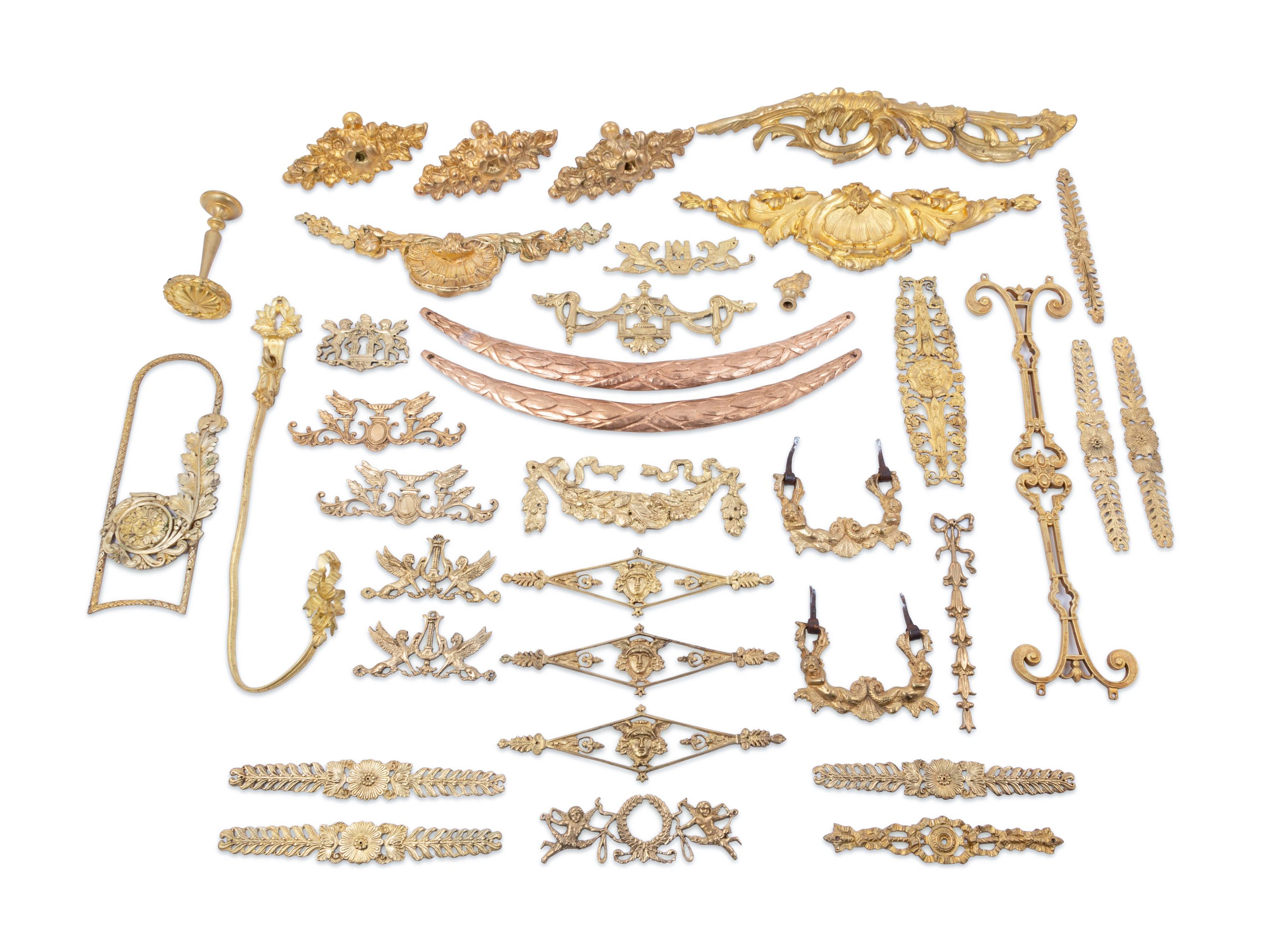 A Collection of Gilt Bronze and Gilt Metal Mounts
