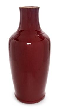 A Chinese Sang-de-Boeuf Glazed Porcelain Vase Height 21 1/2 inches. — 19TH CENTURY