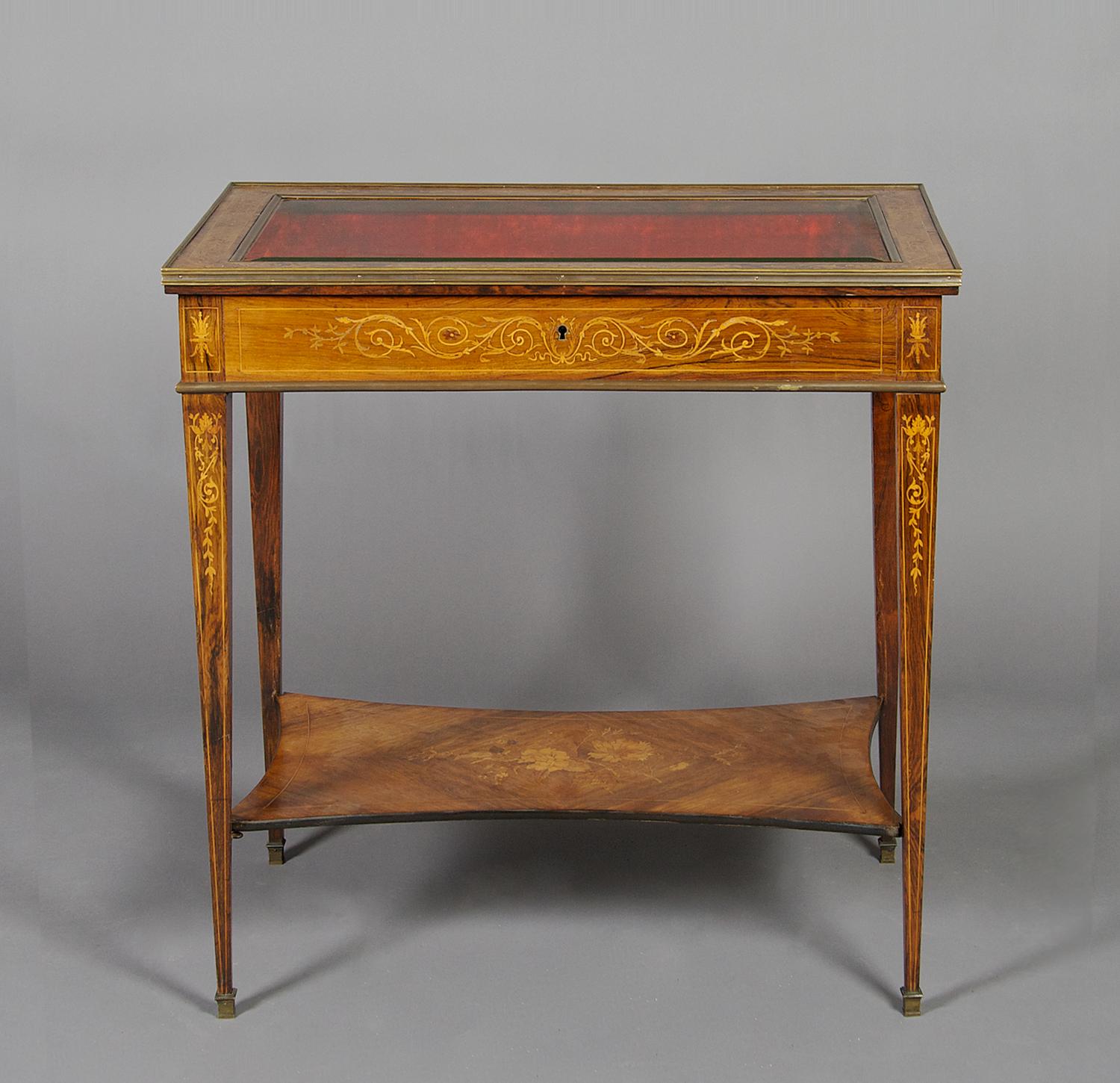 An English Marquetry Vitrine Table, Height 30 1/4 x width 32 1/4 x depth 20 1/2 inches.