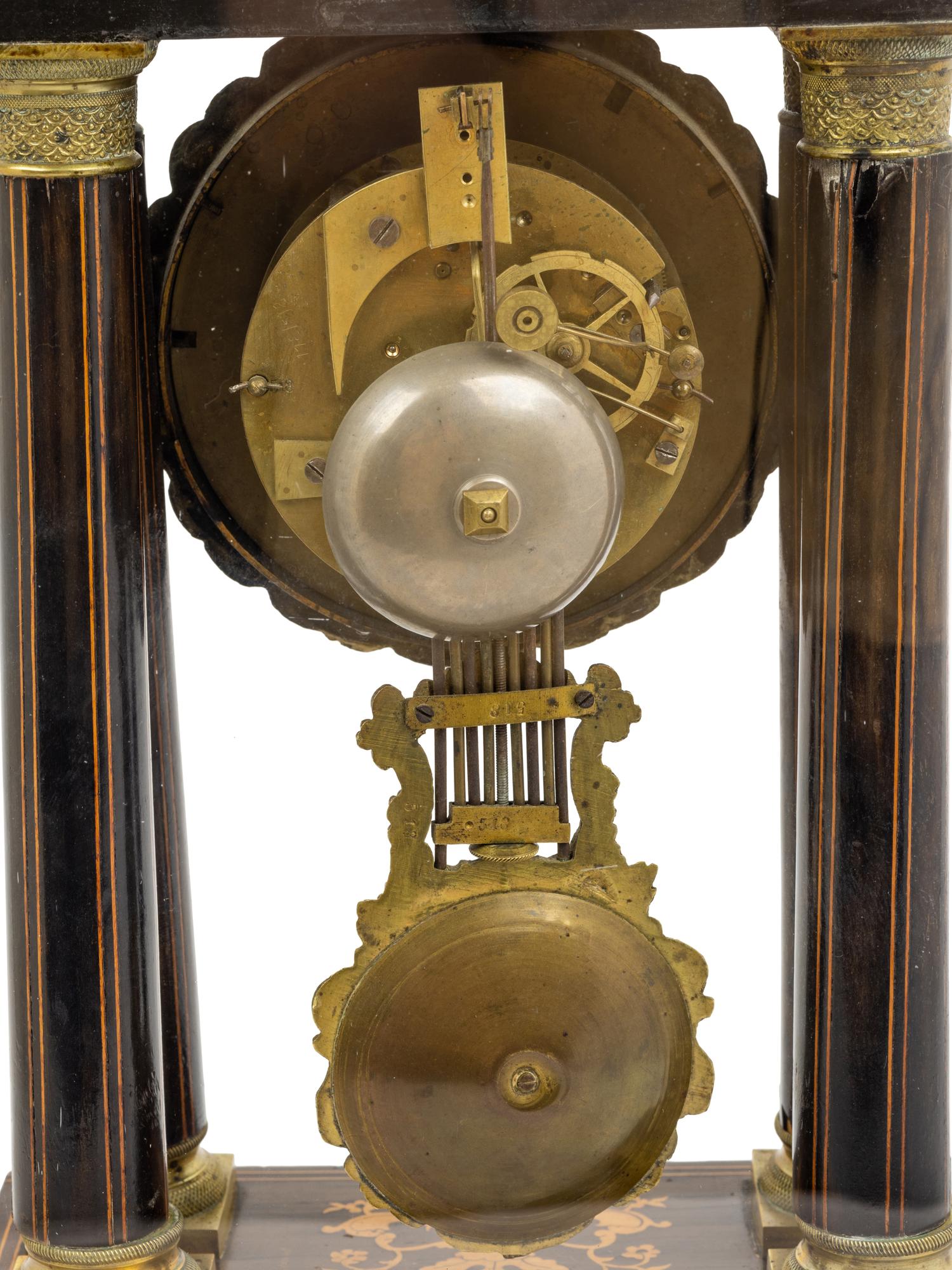 A Charles X Marquetry Mantel Clock