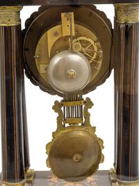 A Charles X Marquetry Mantel Clock