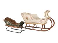 Two Diminutive Paint Decorated Sleds