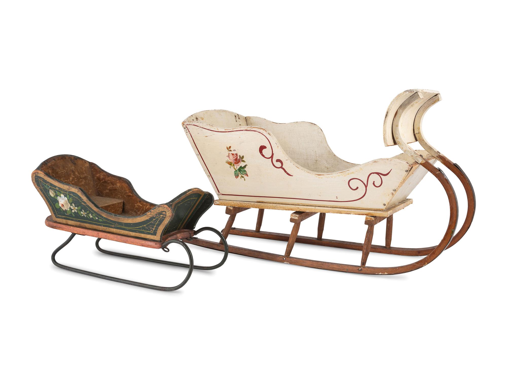 Two Diminutive Paint Decorated Sleds