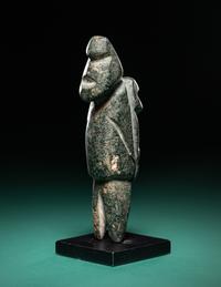 A Mezcala Diorite Standing Figure with an Infant