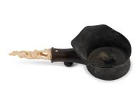 A Chinese Silk Iron with a Figural Handle