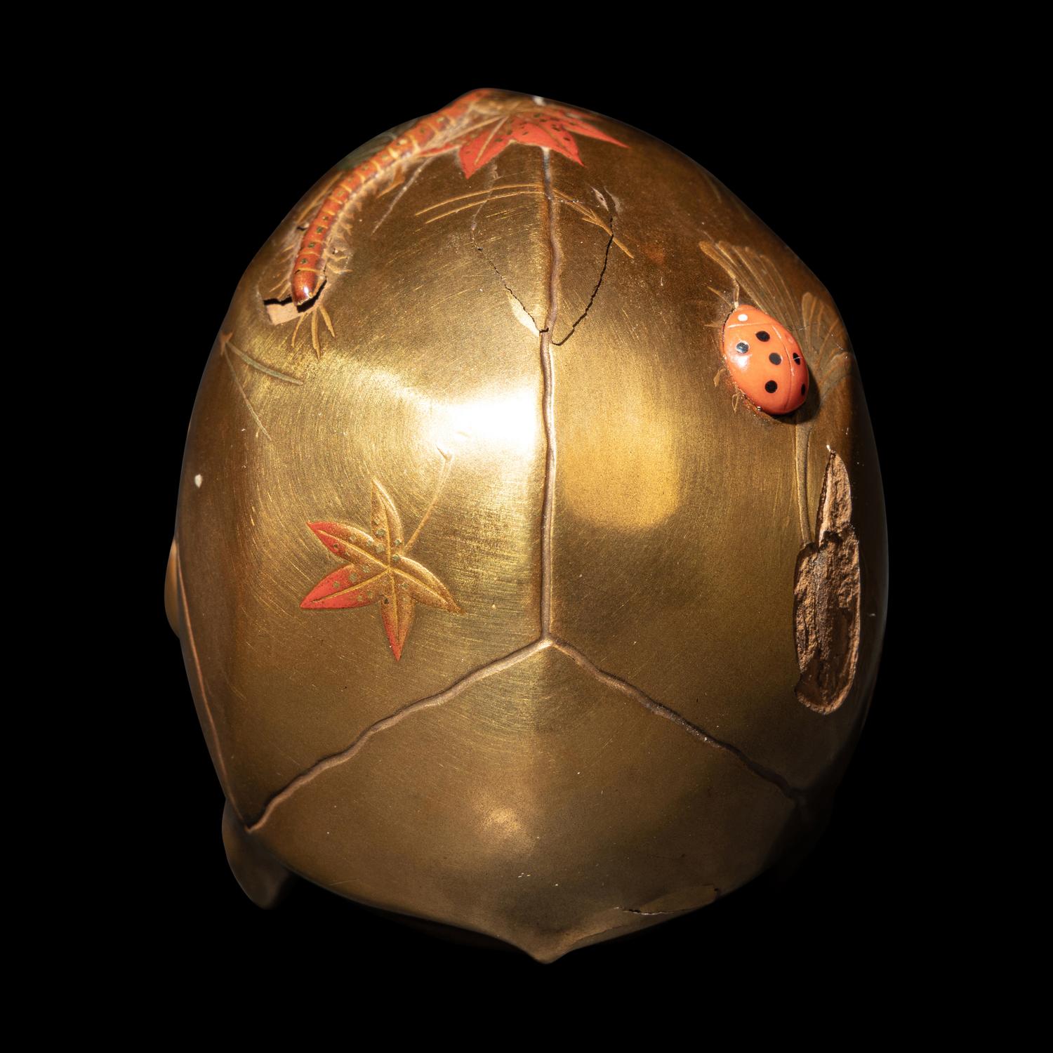A Japanese Gold Lacquered Skull Okimono, Meiji Period, Meiji Period 日本明治時代 '溪崖'款頭骨式置物