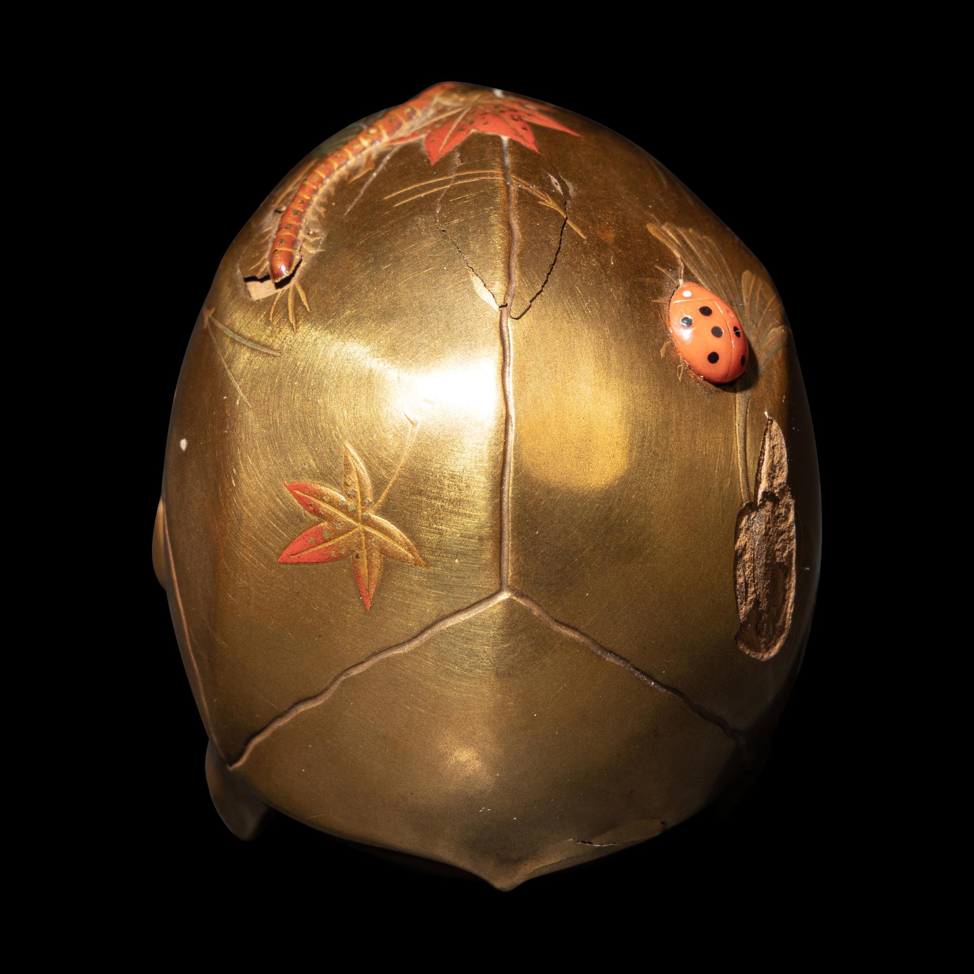 A Japanese Gold Lacquered Skull Okimono, Meiji Period, Meiji Period 日本明治時代 '溪崖'款頭骨式置物