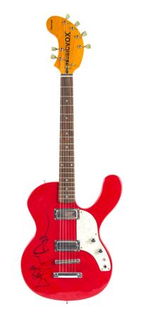 An Autographed Electric Guitar Length 39 inches.