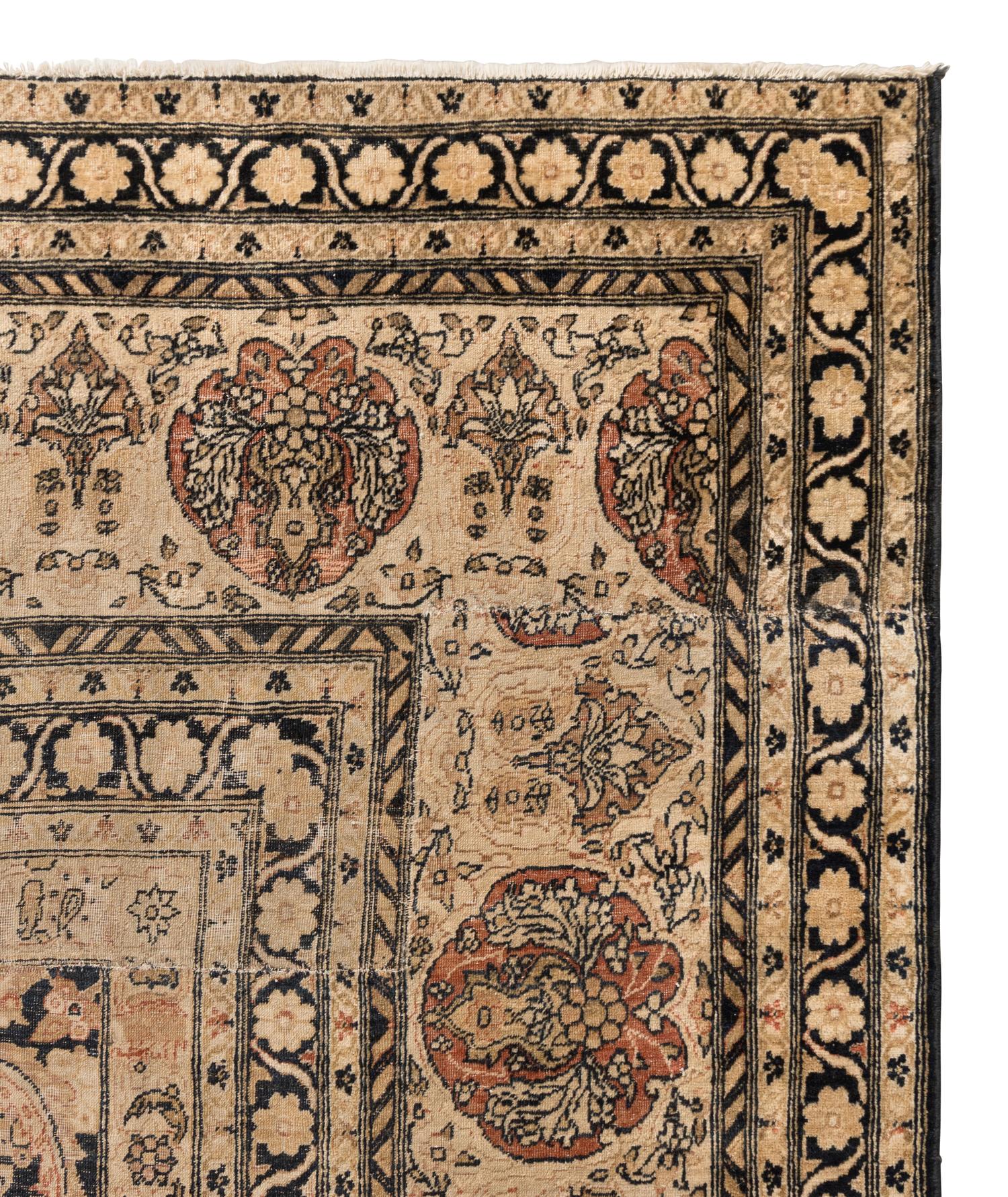 A Tabriz Wool Rug