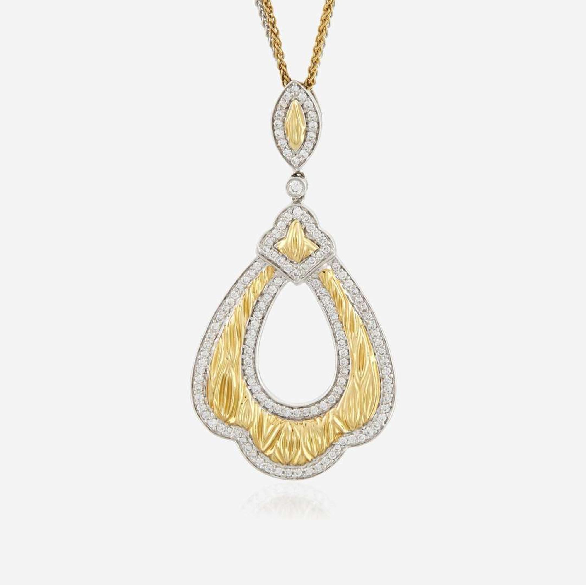A bicolor gold and diamond pendant necklace
