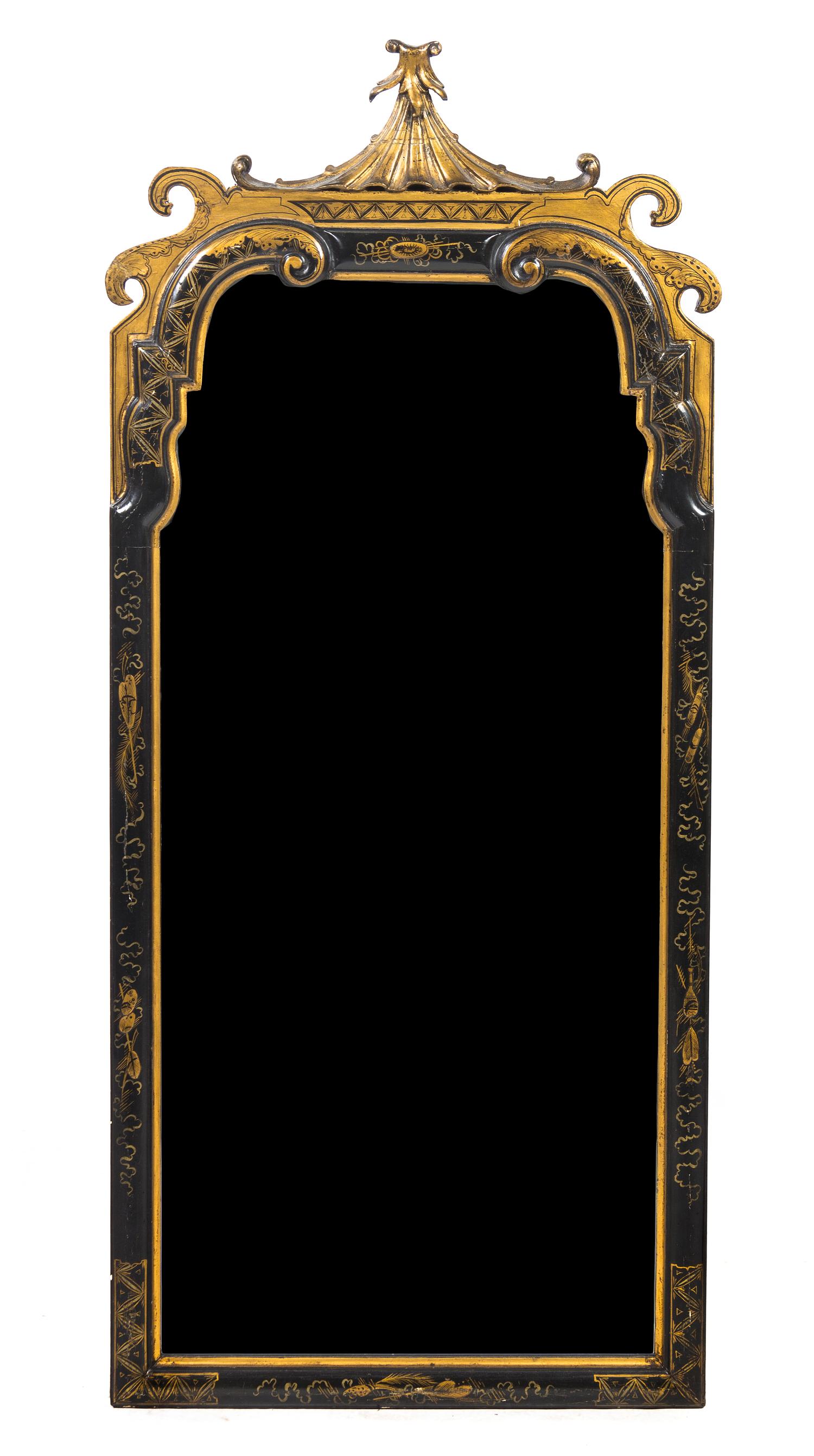 A Queen Anne Style Ebonized and Parcel Gilt Mirror, Height 46 1/2 x width 20 1/8 inches.