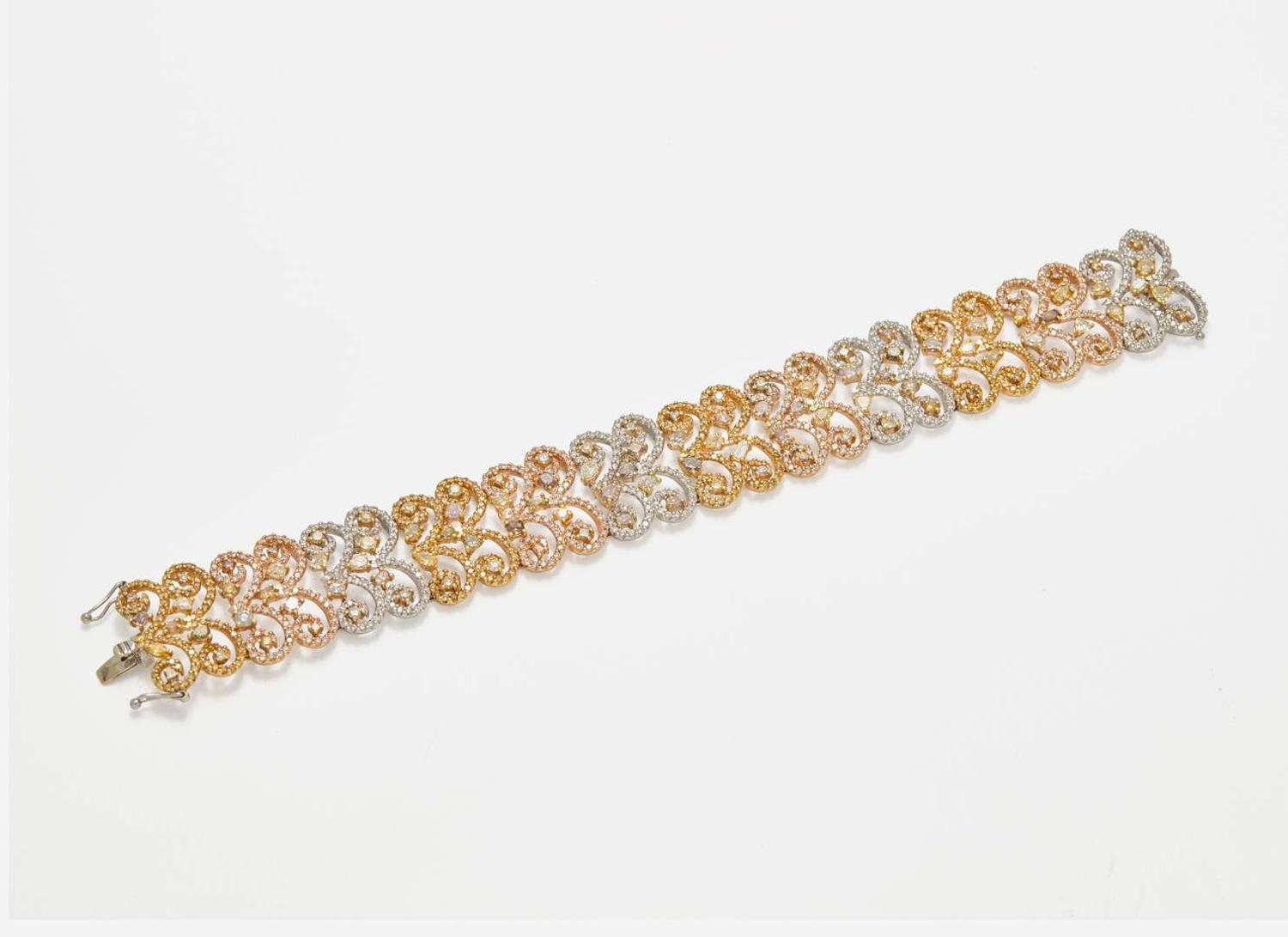 A Three-Tone Rose, White, and Yellow Gold and Multicolor Diamond Bracelet
