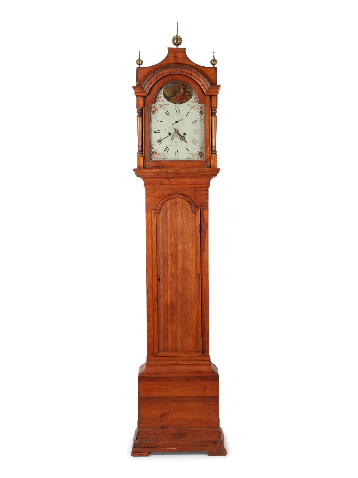 A George III Brass Mounted and Polychrome Decorated Tall Case Clock