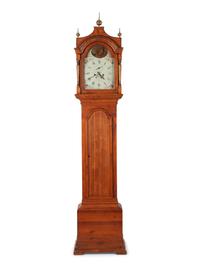 A George III Brass Mounted and Polychrome Decorated Tall Case Clock