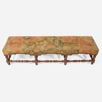 A Baroque Revival carved walnut bench with kilim upholstery late 19th / early 20th century