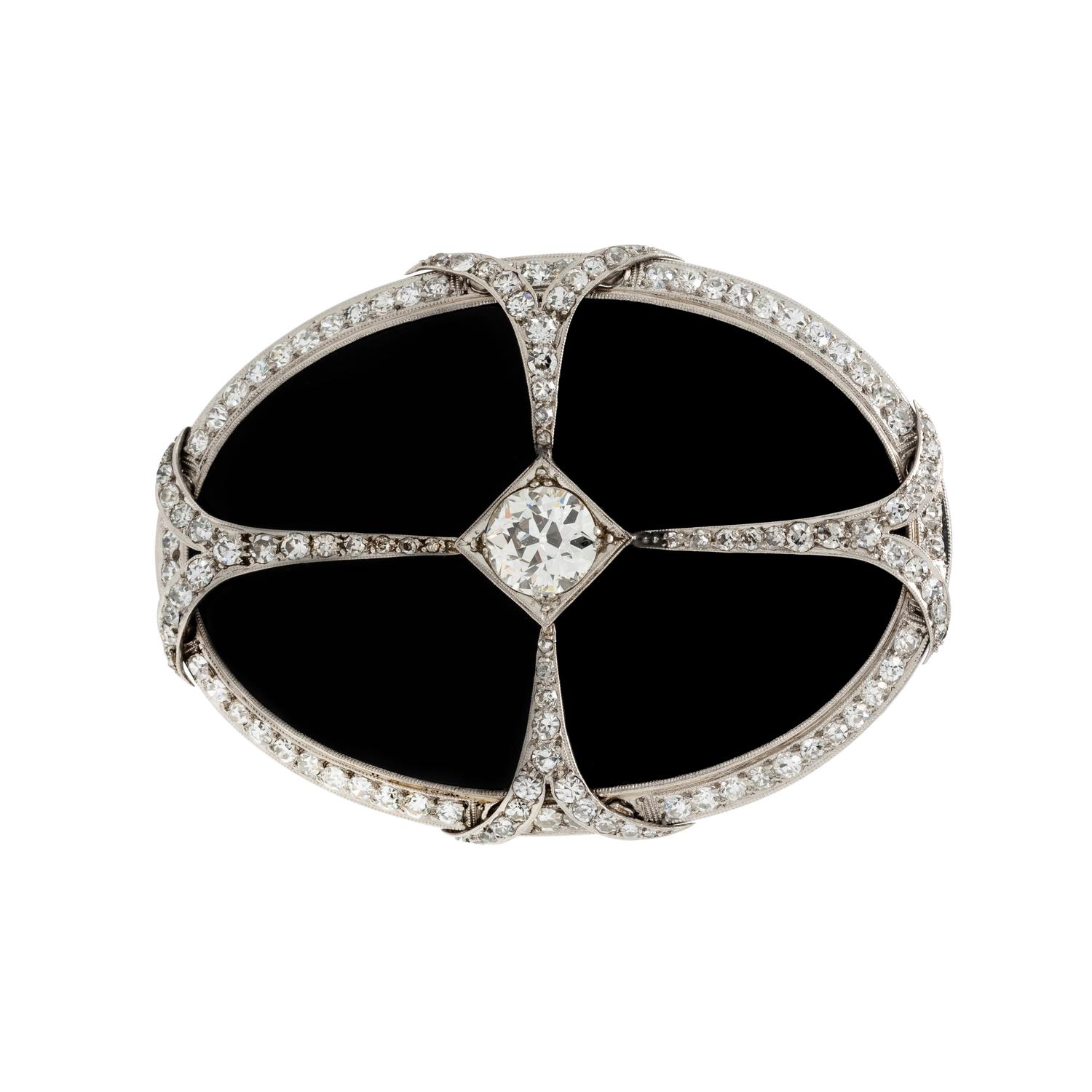 ART DECO, DIAMOND AND ONYX BROOCH