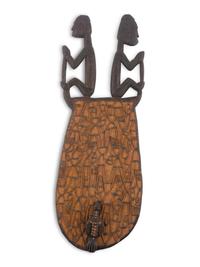An Asmat Carved Wood Shield