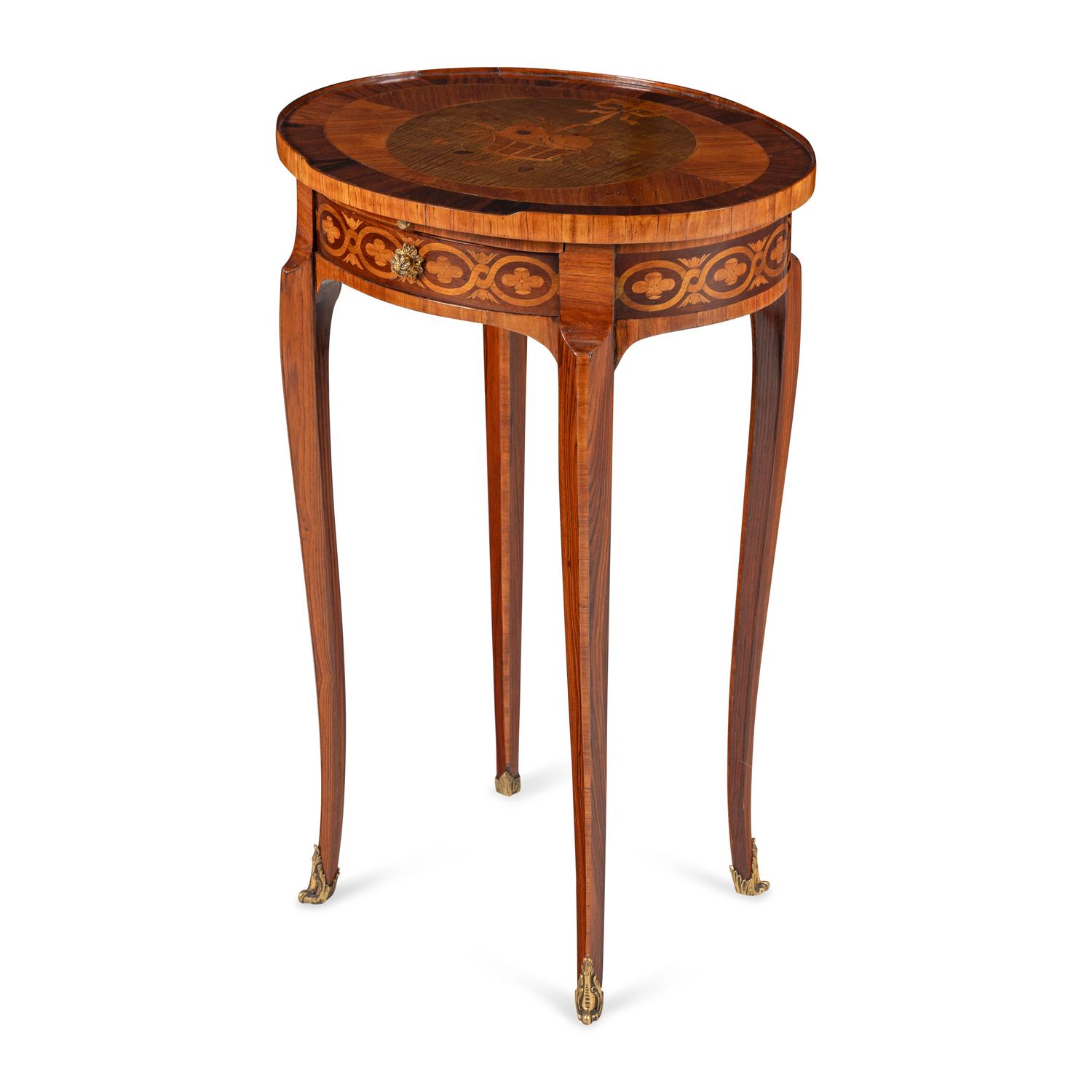 A Louis XVI Style Kingwood and Marquetry Writing Table