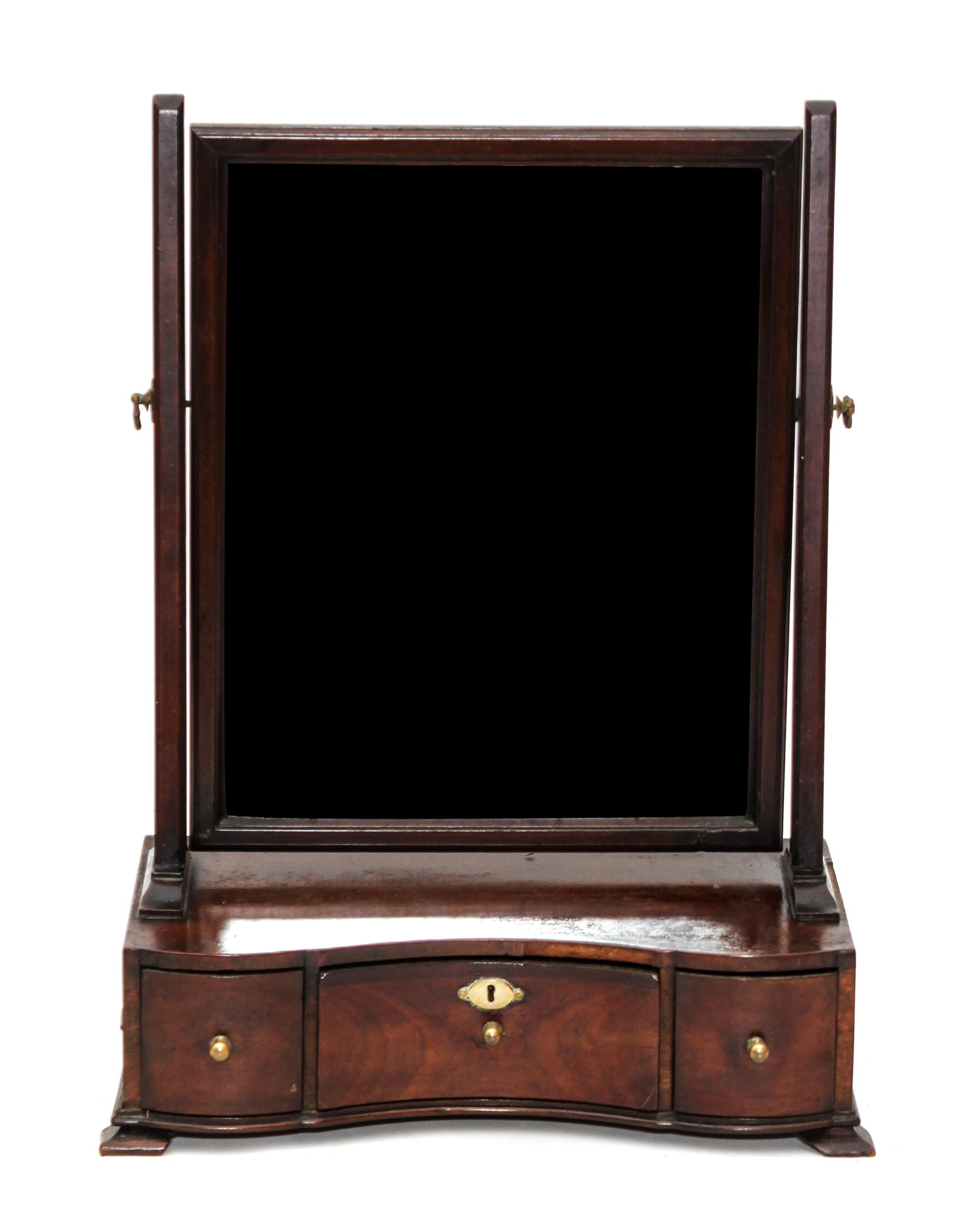 An Edwardian Mahogany Gentleman's Shaving Mirror Height 22 1/2 x width 16 1/8 x depth 9 3/8 inches