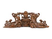 An Italian Renaissance Style Carved Mahogany Figural Transom