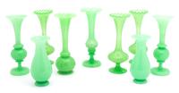 A Group of Nine Green Opaline Glass Bud Vases Height of tallest 8 1/4 inches. — 19TH CENTURY