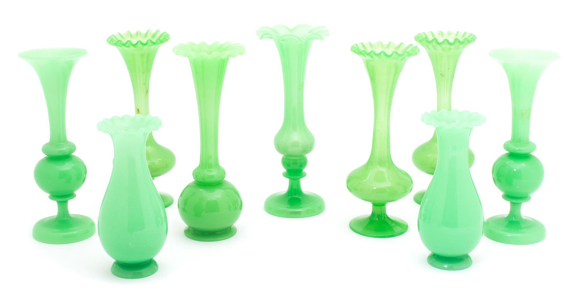 A Group of Nine Green Opaline Glass Bud Vases Height of tallest 8 1/4 inches. — 19TH CENTURY