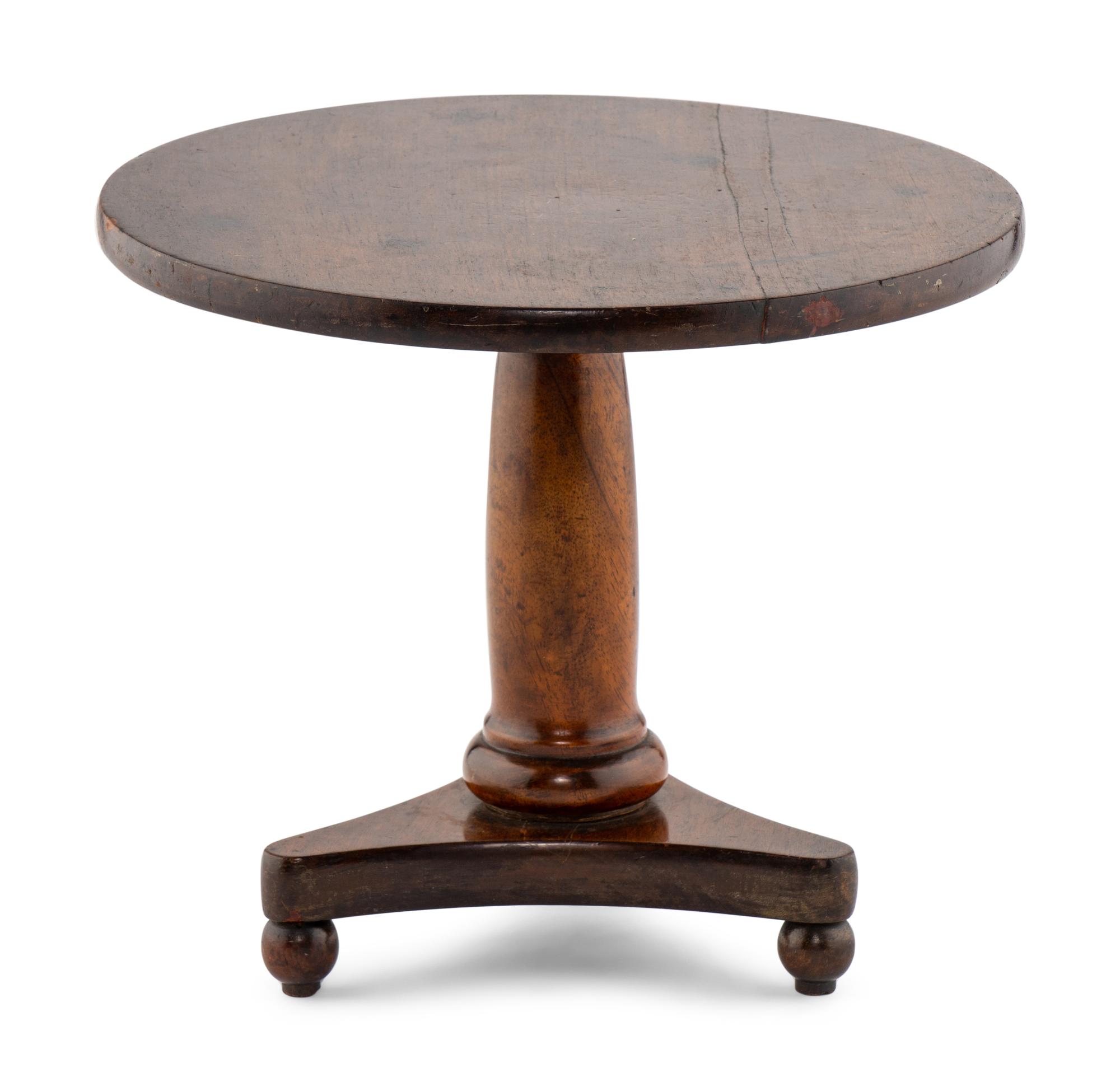 An Empire Diminutive Walnut Center Table