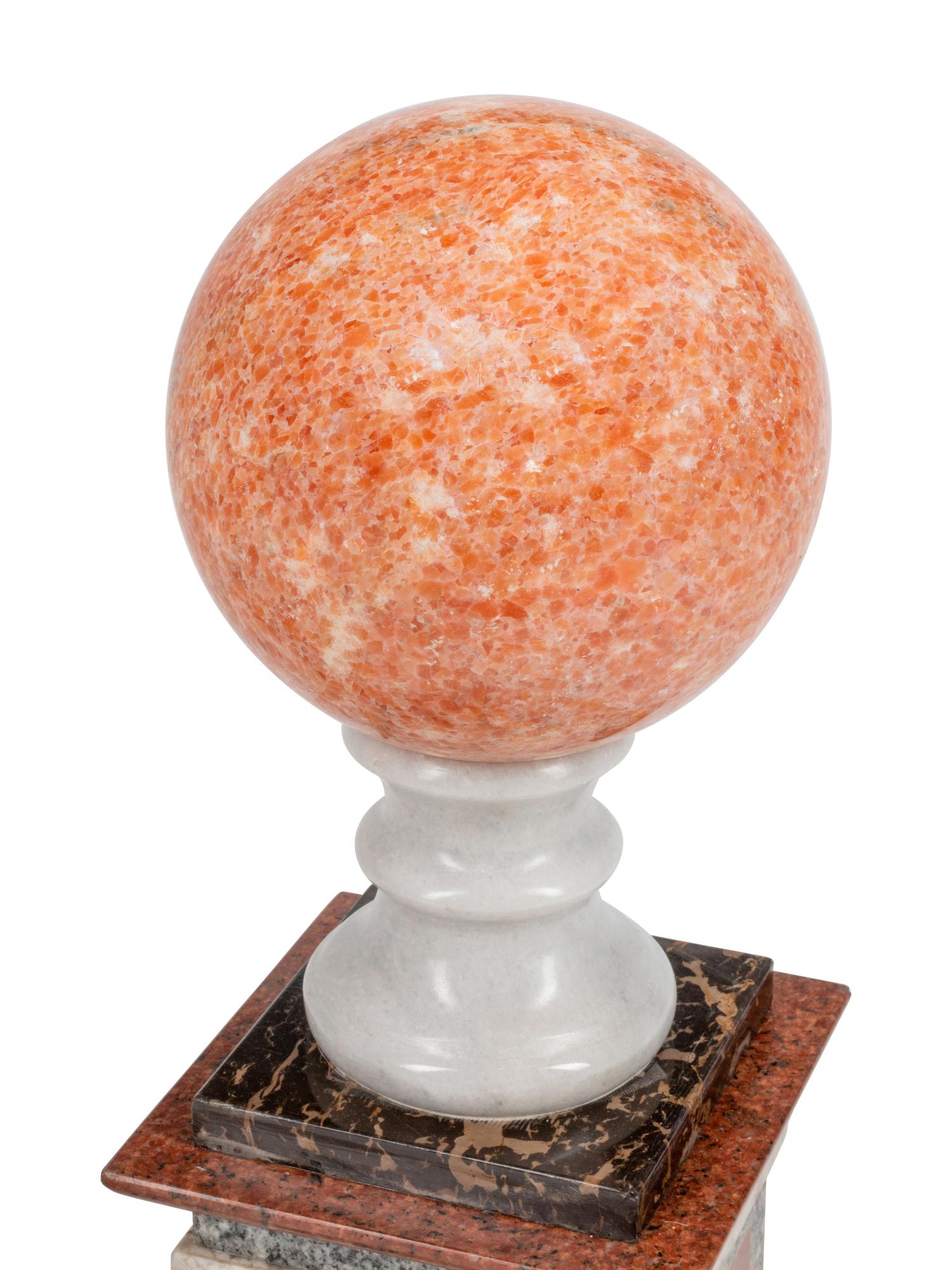 A Pair of Grand Tour Style Vari-Color Marble Ornaments
