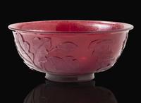 A Chinese carved ruby glass bowl, 18th century 紅琉璃盌配木底座 盌為十八世紀