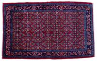 An Oriental Wool Rug 5 feet 4 1/2 inches x 8 feet 10 inches.