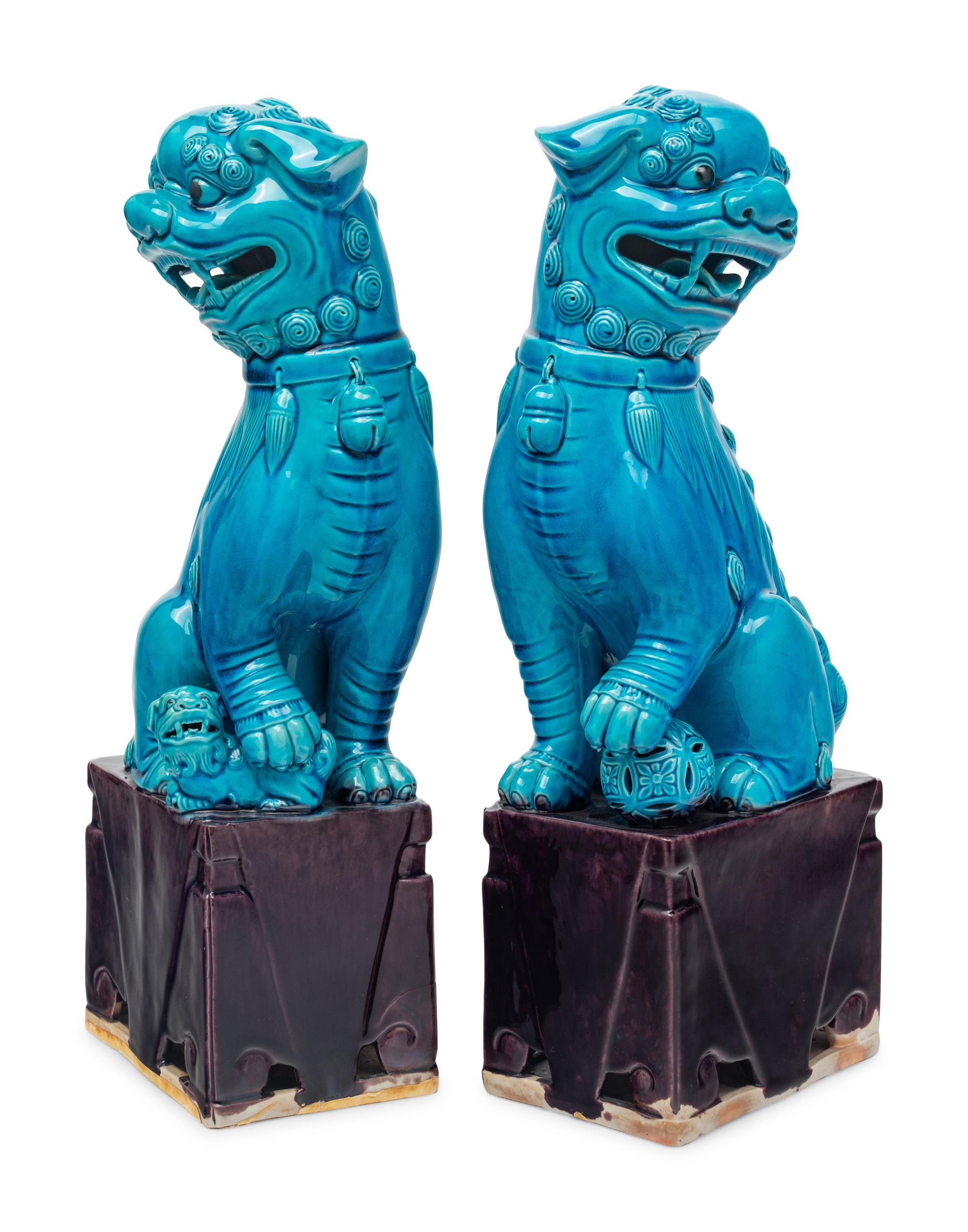 A Pair of Chinese Export Turquoise Glazed Guardian Lions