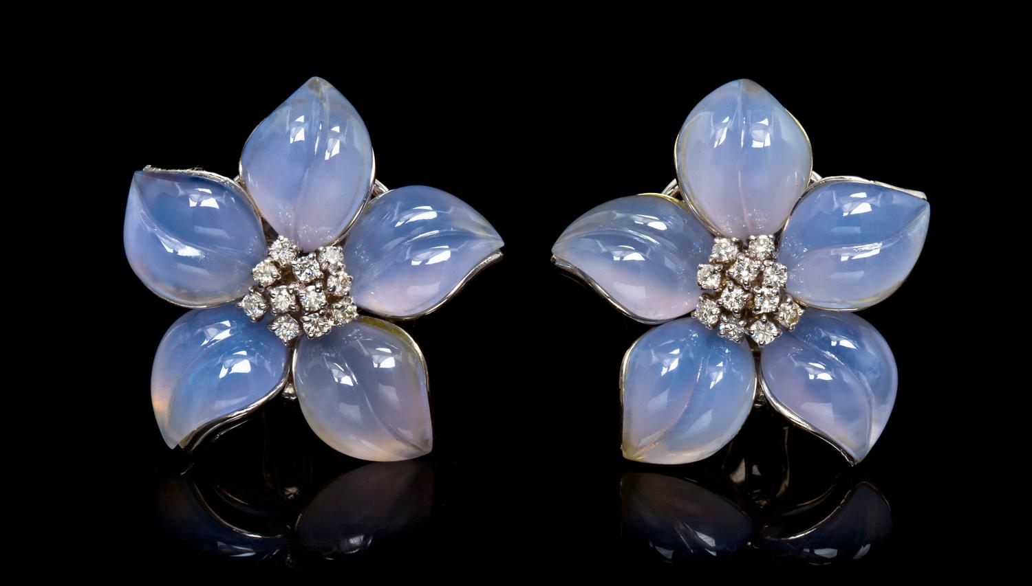 A Pair of White Gold, Chalcedony and Diamond Flower Earclips, 22.50 dwts.