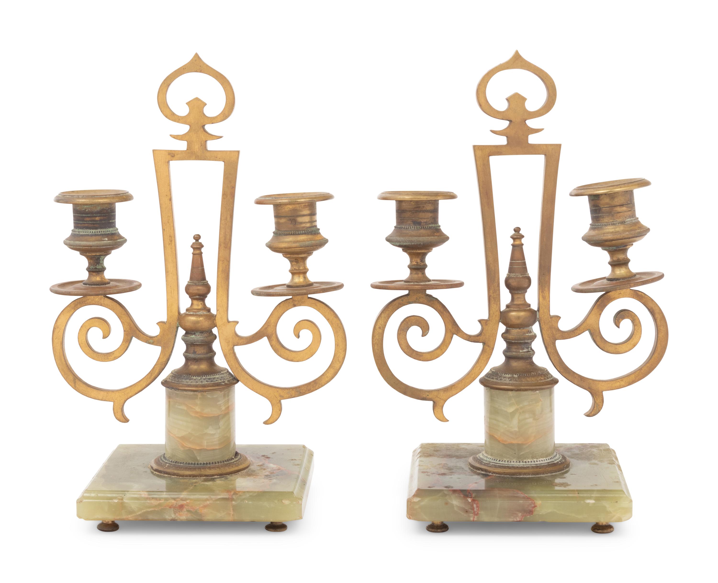 A Pair of Russian Gilt Bronze and Onyx Two-Light Candlesticks