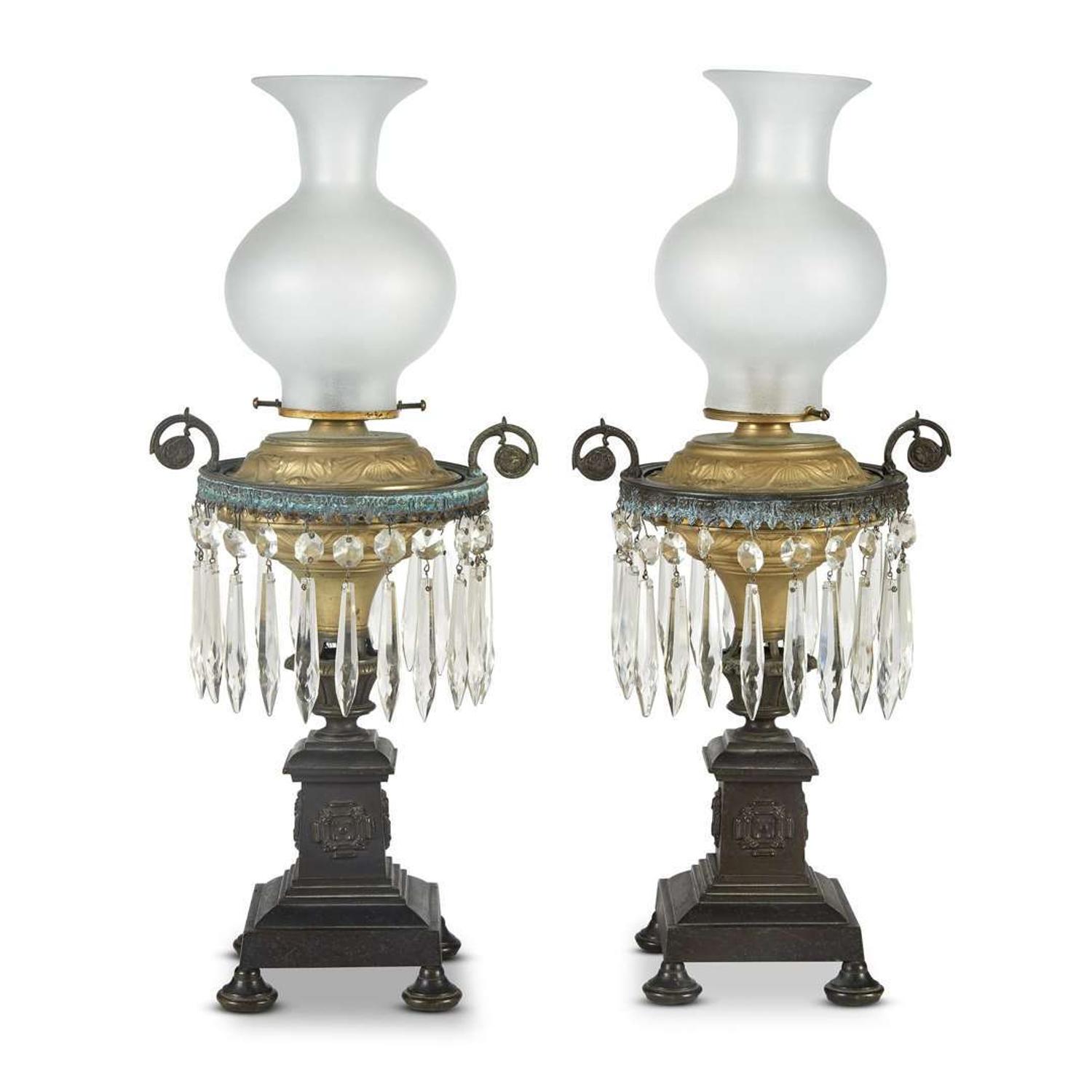 Pair of patinated and gilt-bronze Argand lamps 19th century