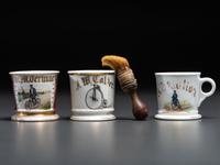 Three Cyclist's Porcelain Shaving Mugs