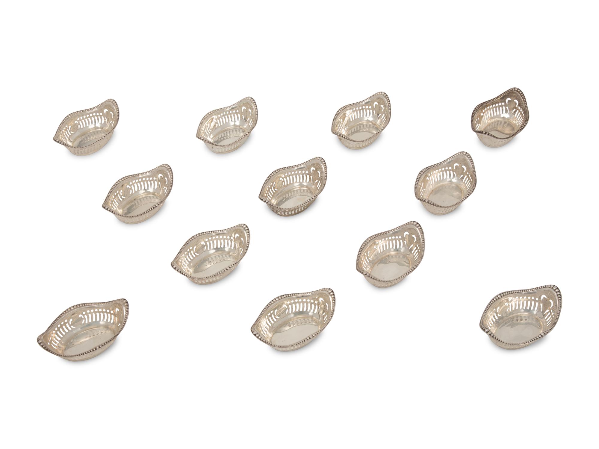 A Set of Twelve American Silver Nut Dishes
