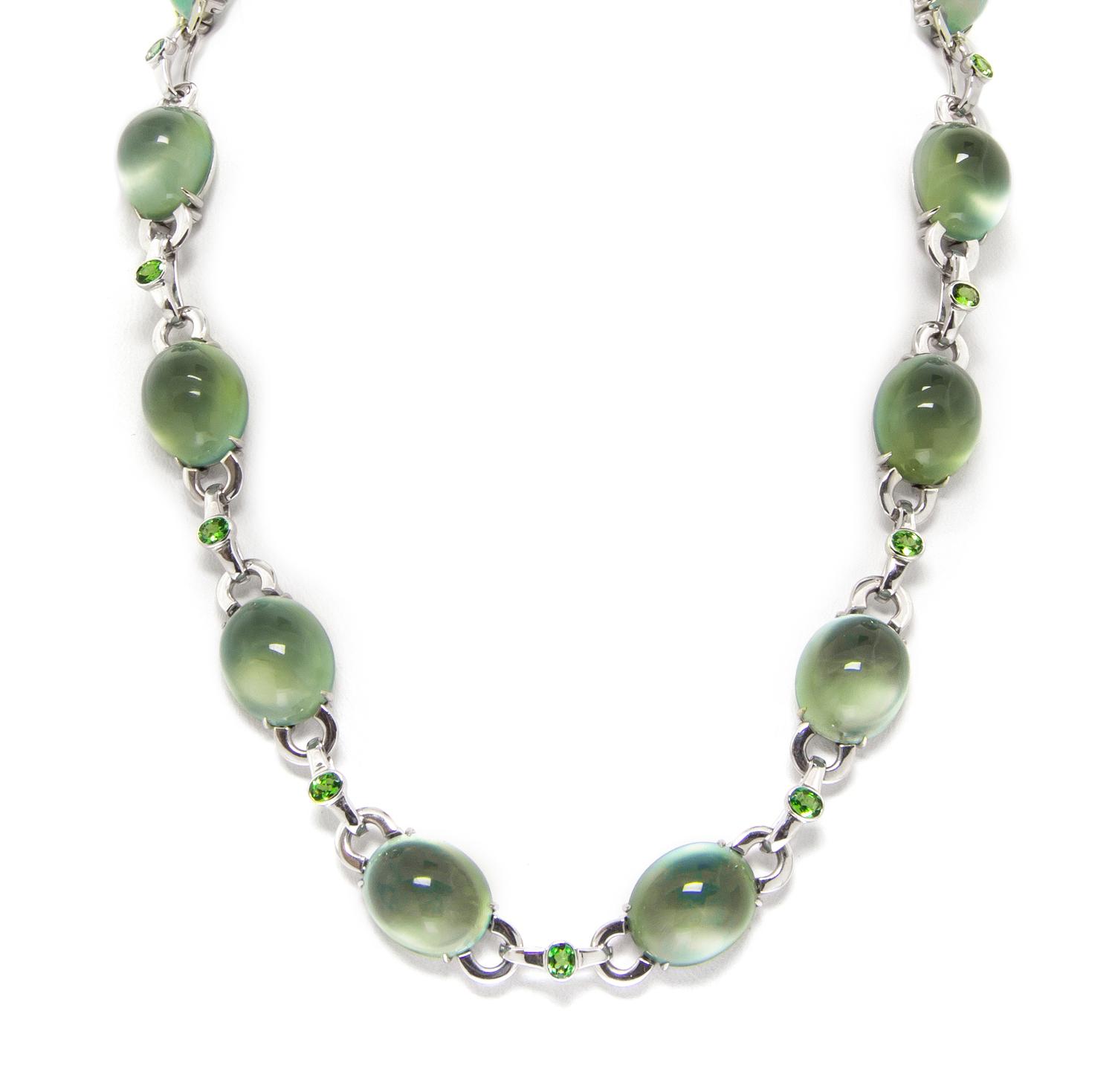 An 18 Karat White Gold, Prehnite, Green Tsavorite Garnet and Diamond Demi Parure, 65.40 dwts.