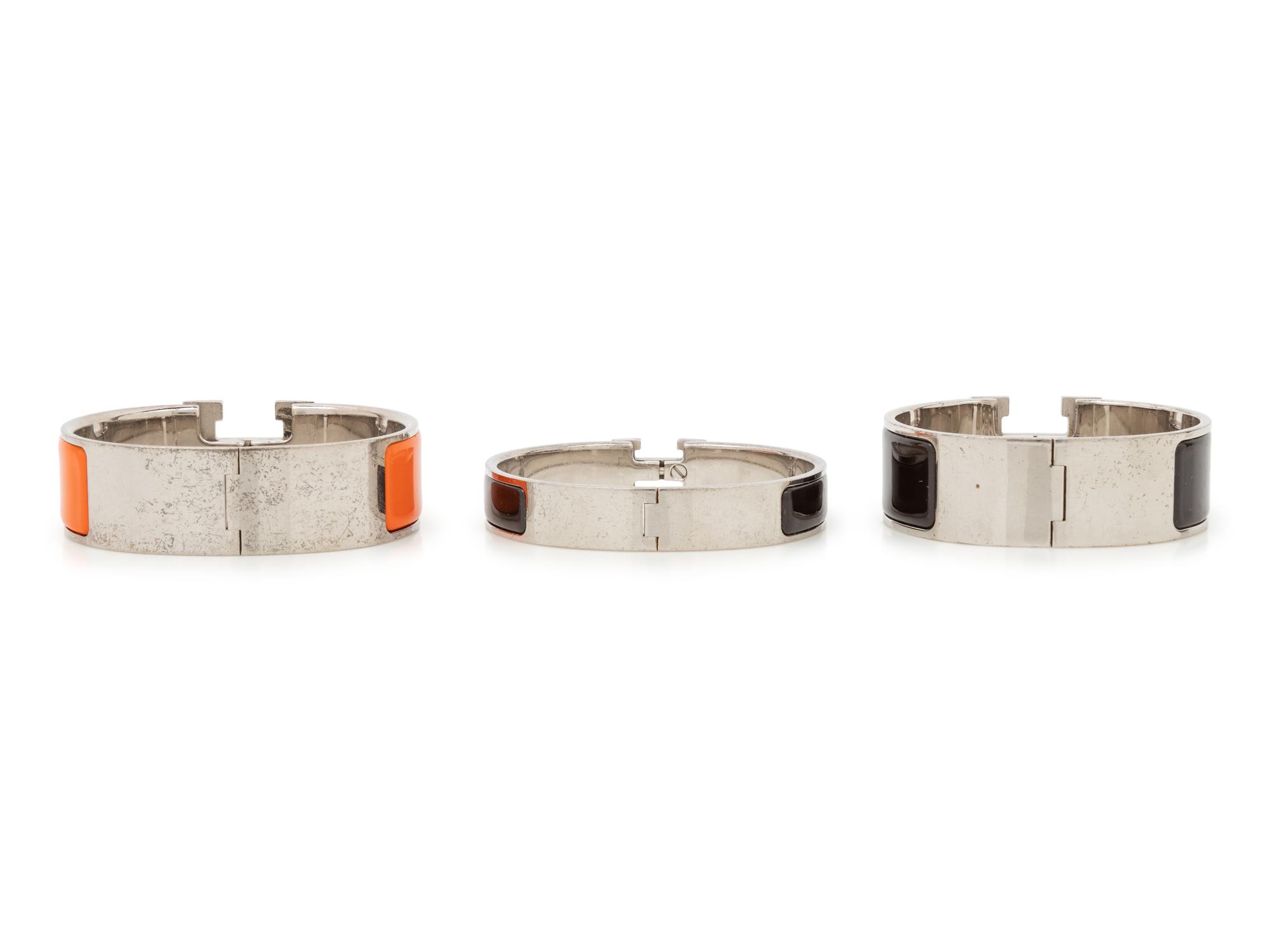 Three Hermès Bracelets: Two Clic Clac & One Clic H