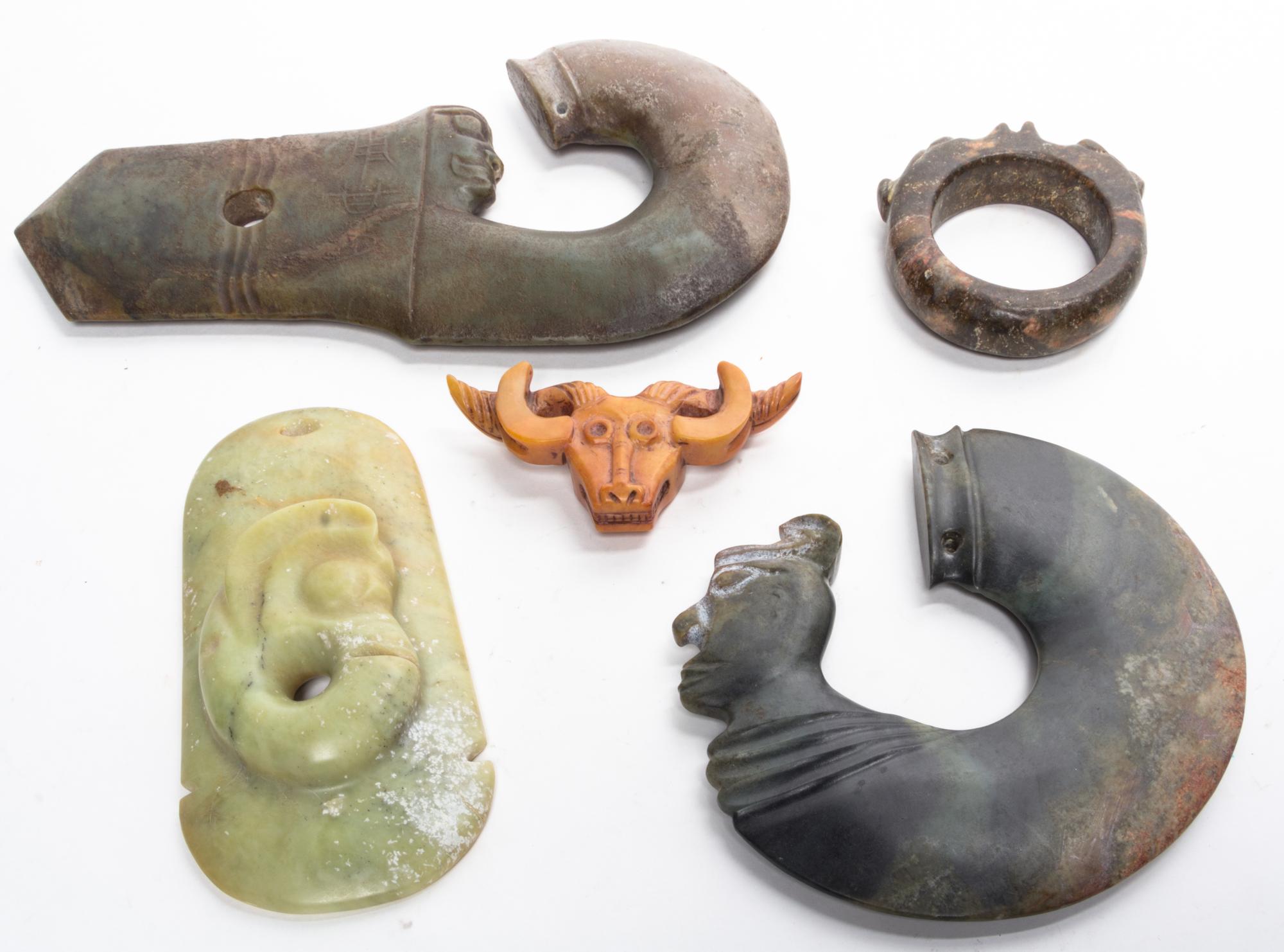 A Group of Archaistic Hardstone Articles Length of largest 12 3/4 x width 6 1/2 inches.
