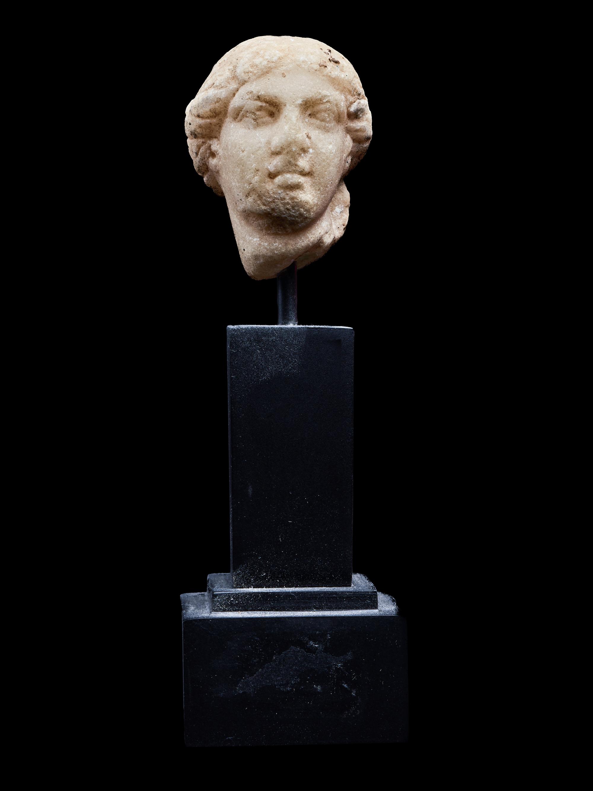 A Roman Marble Head of a Goddess