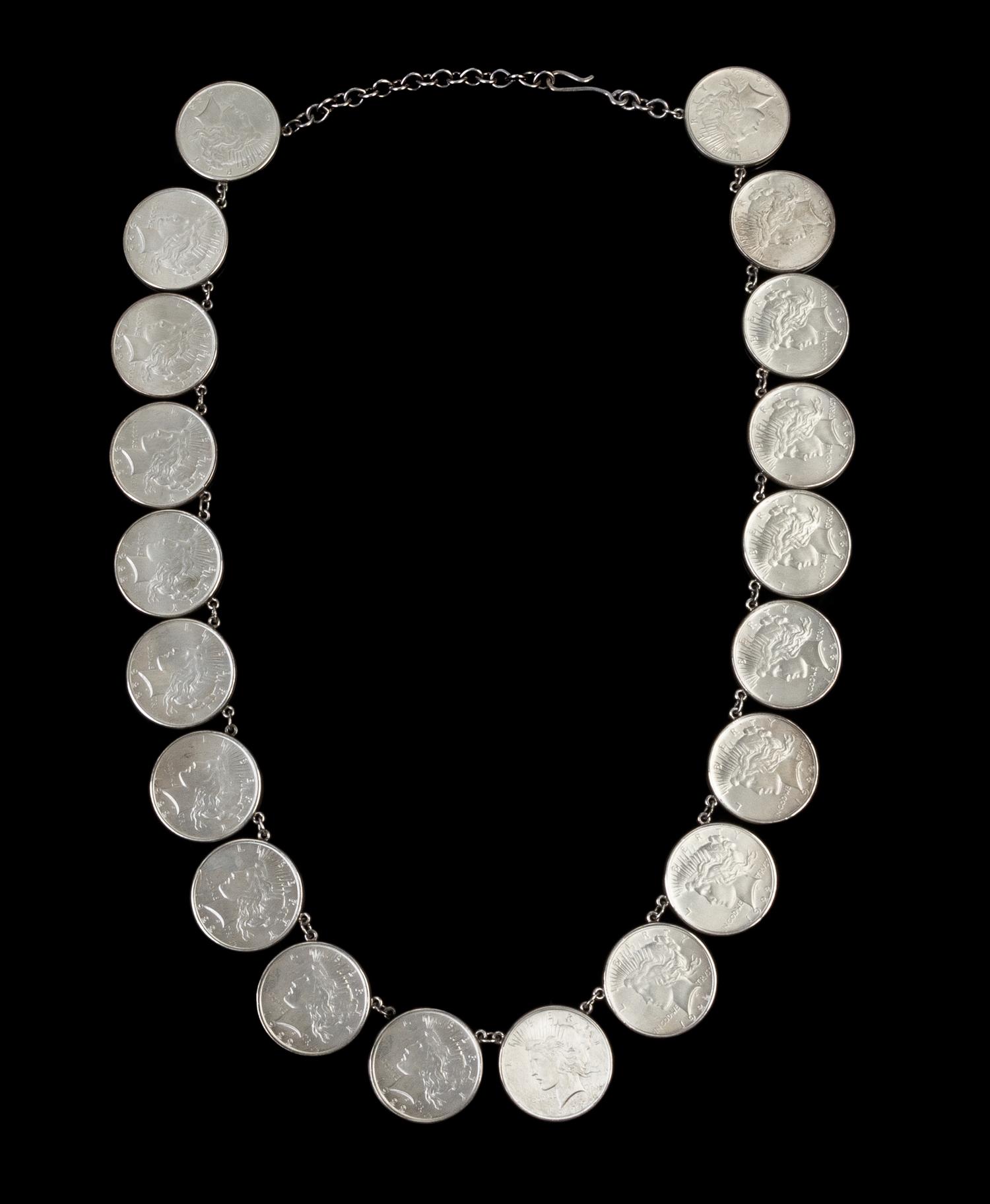 A Group of Twenty United States 1922 Peace Silver Dollars