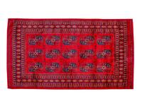 A Bokhara Wool Rug — 20TH CENTURY