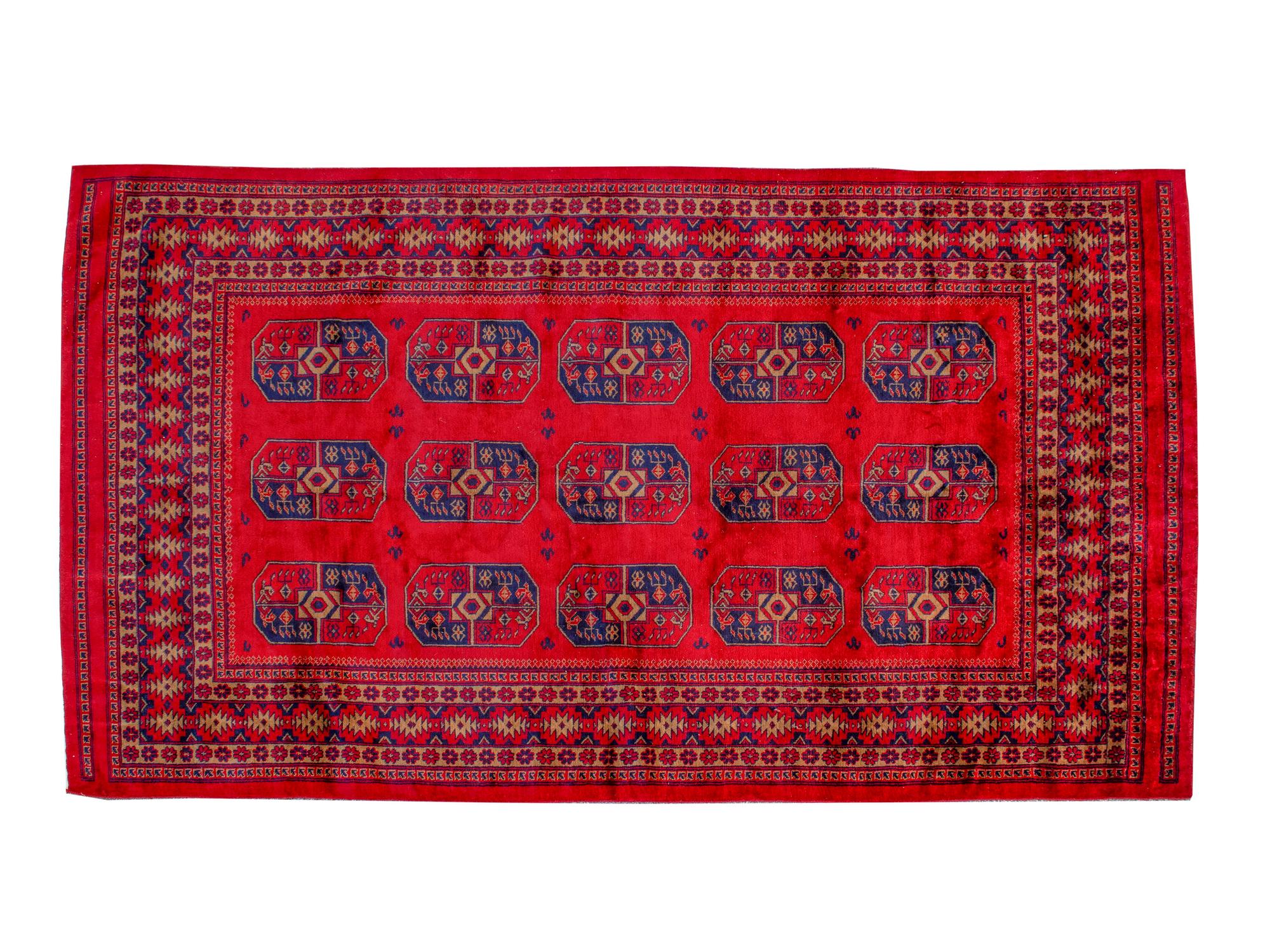 A Bokhara Wool Rug — 20TH CENTURY
