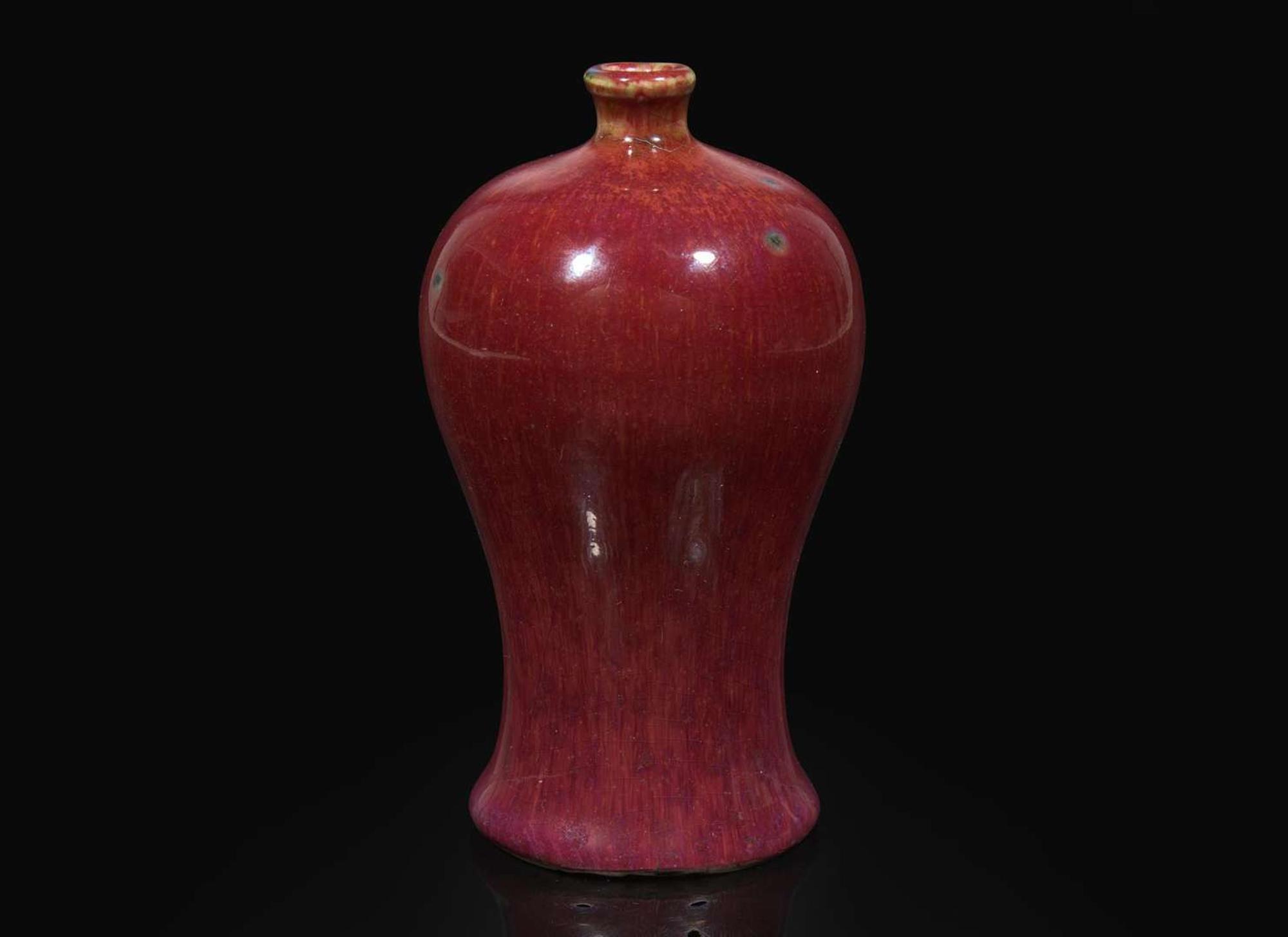 A small Chinese copper-red glazed cabinet vase, Meiping, probably Qianlong period 銅紅釉小梅瓶 或清乾隆