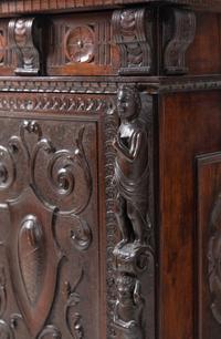 An Austrian Carved Walnut Cabinet