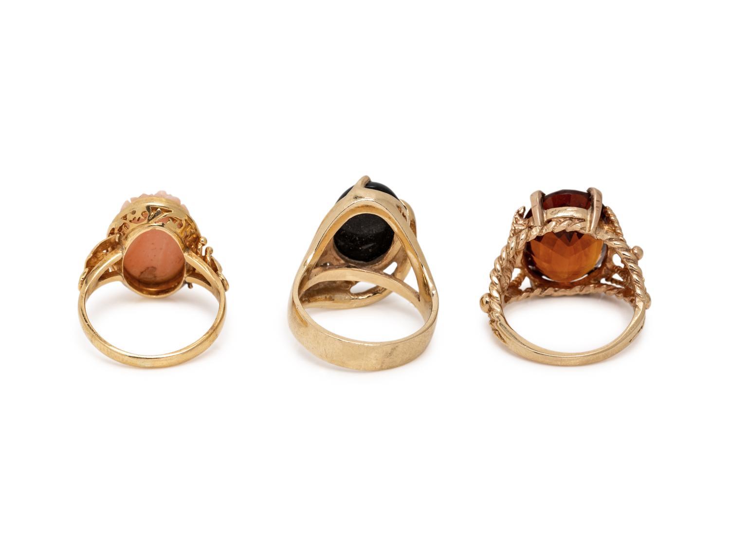 COLLECTION OF YELLOW GOLD AND GEMSTONE RINGS