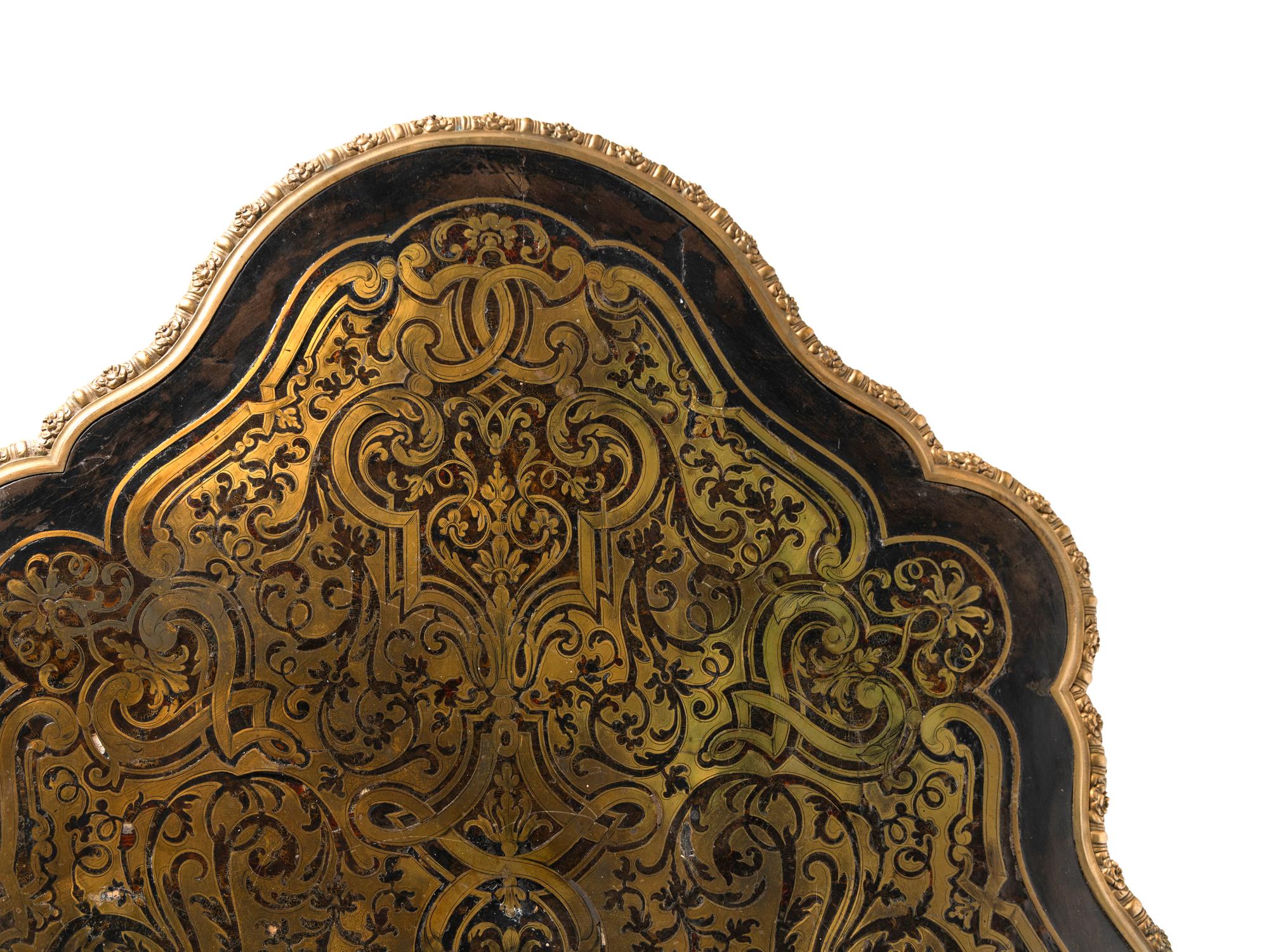 A Napoleon III Gilt Bronze Mounted Boulle Marquetry Center Table
