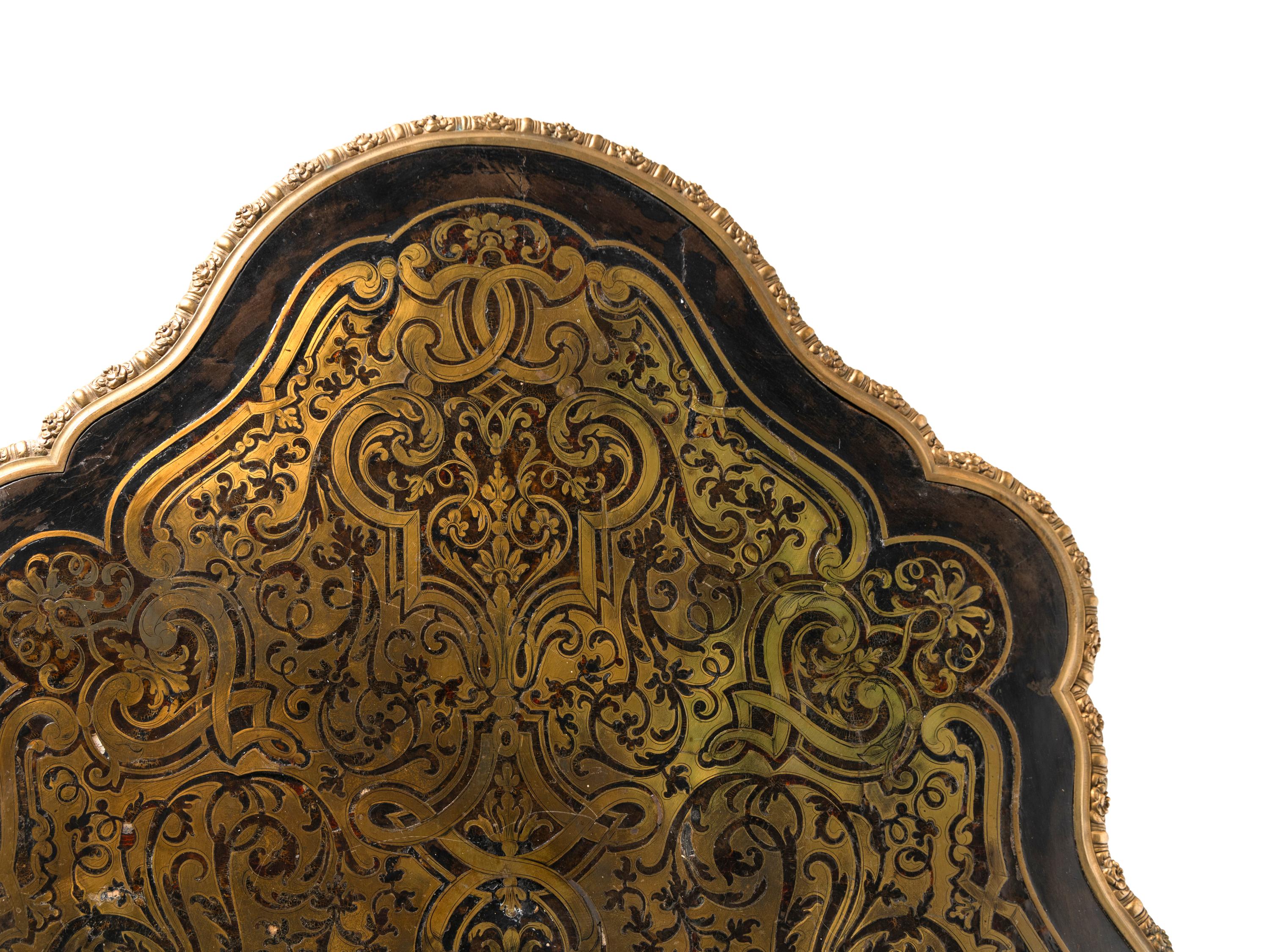 A Napoleon III Gilt Bronze Mounted Boulle Marquetry Center Table