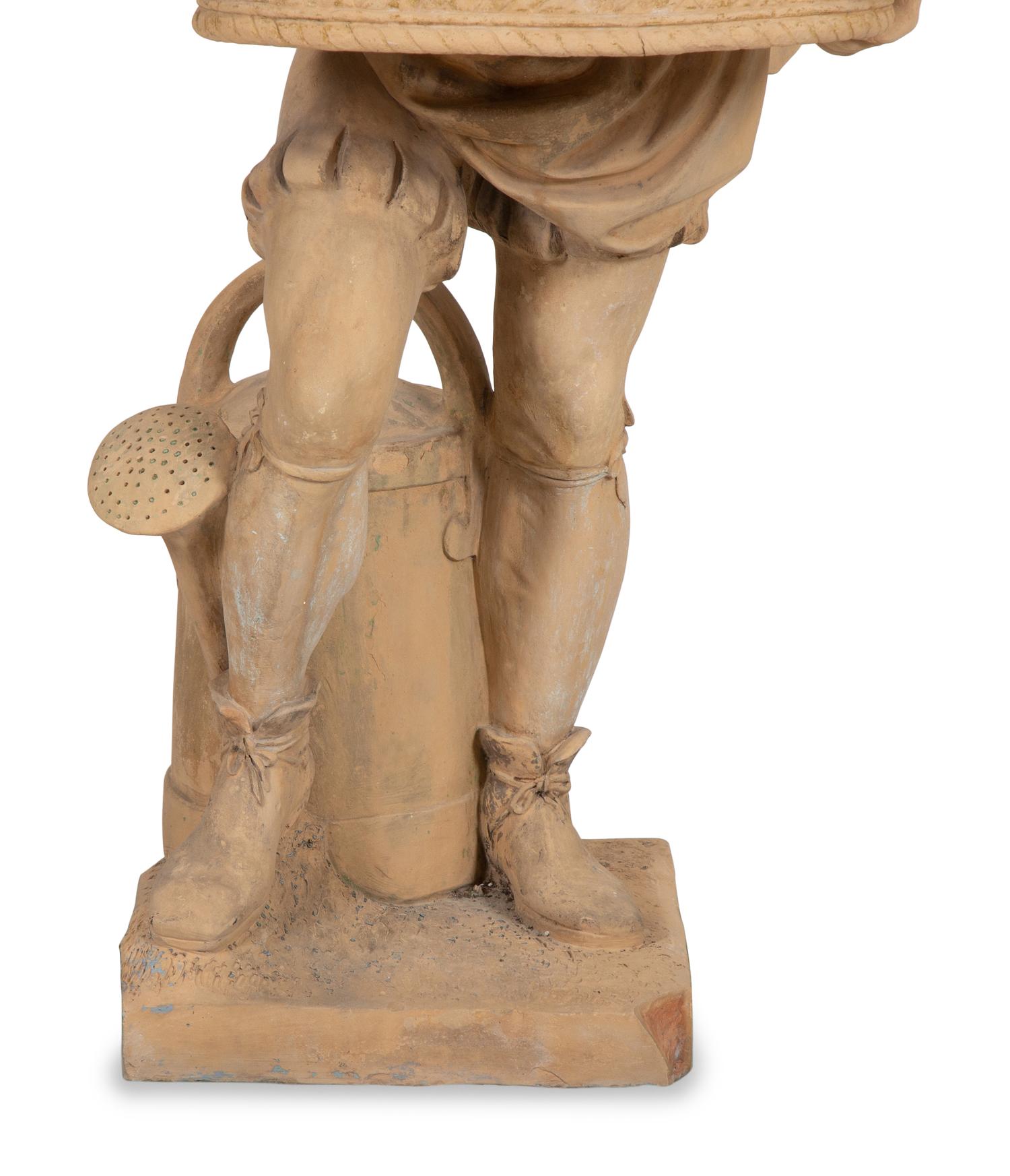 A Terra Cotta Figural Jardinière