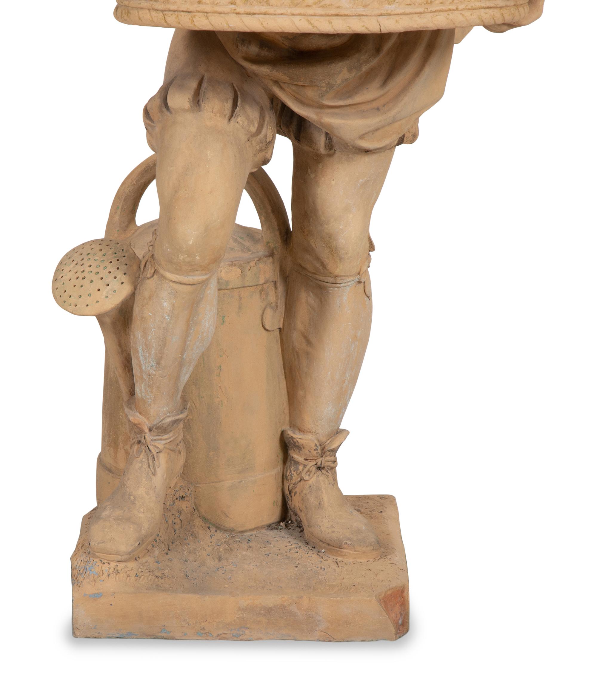 A Terra Cotta Figural Jardinière
